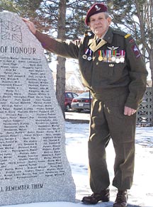 Pte. Augie Vande Velde showing his recently-reassembled second war Canadian Airborne Division uniform.